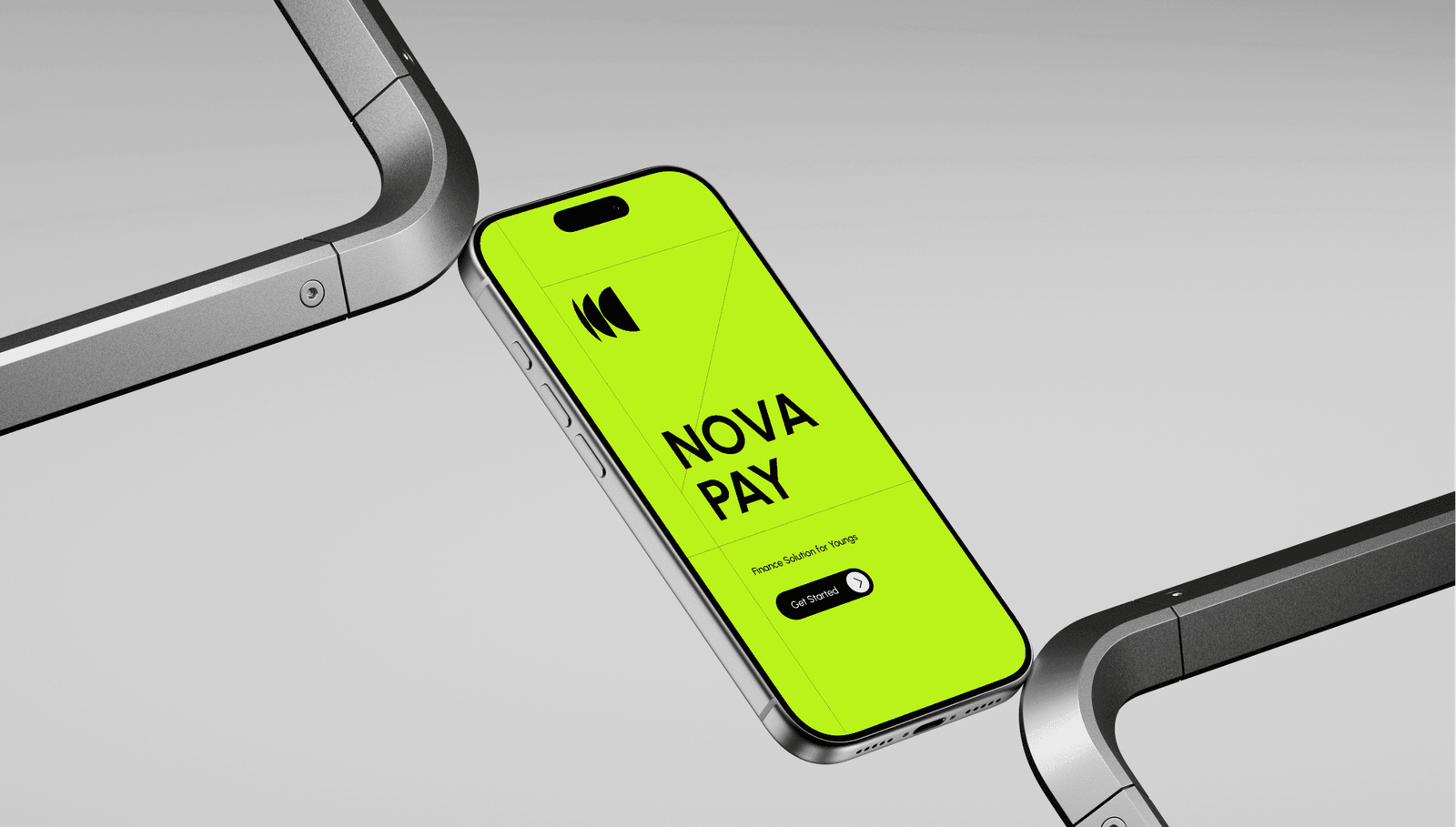 A close-up view of a bright green smartphone lying flat on a surface between two silver devices. The phone screen displays the text 'NOW OR NEVER' in bold black letters